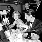 Alain Delon and Romy Schneider at the Easter gala held at the International Sporting Club. Monte Carlo 1959. - Photo by Edward Quinn