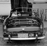 Alain Delon and Jane Fonda arriving at the film set of "Les Félins" ("Love Cage"). Ferrari 250 GT Spider California 1961. Antibes 1964. This car of Alain Delon was hammered 2015 for a record-breaking $18.5 million at an auction at Artcurial in Paris. The 250 GT Spyder California, Chassis No 2935, had been bought new by the actor Gérard Blain, then sold to fellow actor Alain Delon, who was photographed several times at the wheel of this machine, including in 1964. One of 37 examples, this Pininfarina-designed cabriolet, its whereabouts unknown to marque historians until now, is bound to attract the attention of collectors of important historic Ferrari. - Photo by Edward Quinn