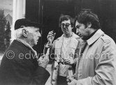 Max Ernst with Kinetic artists Julio Le Parc and Yvaral - with glasses "Pour Une Vision Autre" ("Glasses for Another Vision") by Le Parc, in front of gallery Denise René rive gauche. On the occasion of the exhibition "L’idée et la matière". Paris 1974. - Photo by Edward Quinn