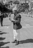 Mike Hawthorn filming. Monaco Grand Prix 1957. - Photo by Edward Quinn