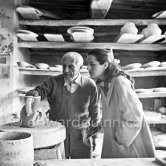 Pablo Picasso and Françoise Gilot at the Madoura pottery. Vallauris 23.3.1953. - Photo by Edward Quinn