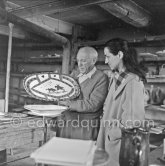 Pablo Picasso and Françoise Gilot at the Madoura pottery. Vallauris. 23.3.1953. - Photo by Edward Quinn