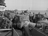 Arrival of participants, entrance to the parc fermée. N° 264, Walshaw / Patchett on Hillmann. Rallye Monte Carlo 1951. - Photo by Edward Quinn