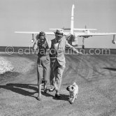 Edward Duke of Windsor and the Duchess of Windsor. and their pet dog Preezie. Nice Airport 1954. - Photo by Edward Quinn