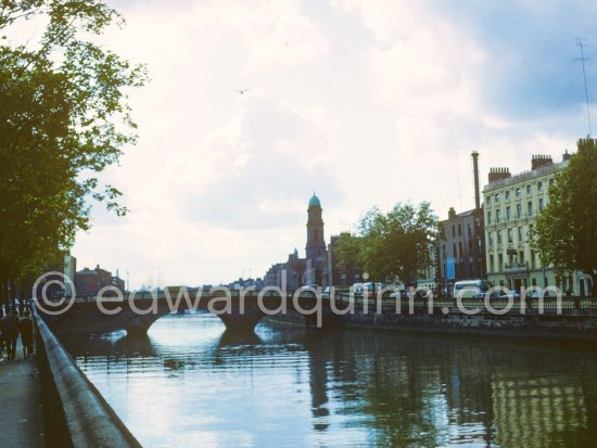 The River Liffey, Arran Quay. Father Mathew Bridge, St Paul\'s Church on the other side. Dublin 1963. - Photo by Edward Quinn