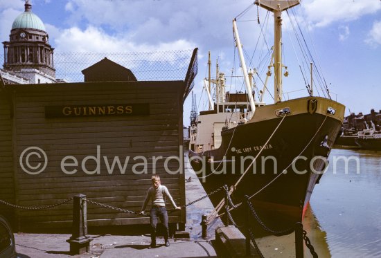 The River Liffey with Custom House and the Guinness Brewery ship The Lady Grania loading barrels. Dublin 1963. - Photo by Edward Quinn