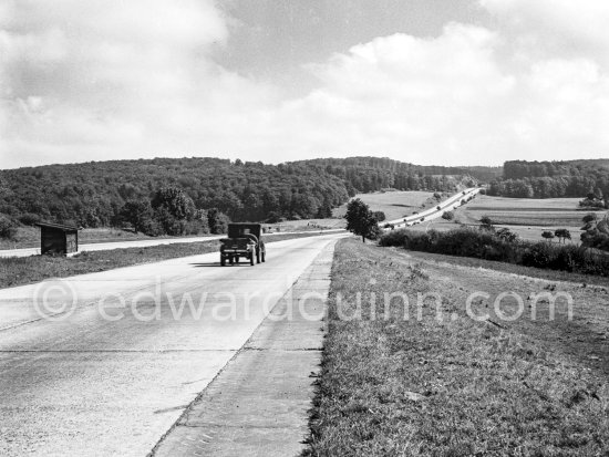 German Autobahn near Hannover 1953. Car: Willys Jeep - Photo by Edward Quinn