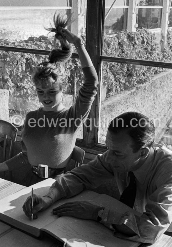 Brigitte Bardot and Raymond Buissière at Coco Beach. Nice 1955. - Photo by Edward Quinn