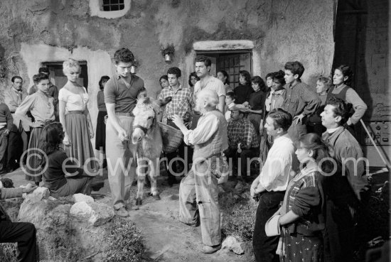 Brigitte Bardot and Stephen Boyd with a donkey during the shooting of "Les Bijoutiers du clair de lune" ("The Night Heaven Fell"), on the grounds of the Studios de la Victorine in Nice. Directing was Brigitte’s ex-husband Roger Vadim. Nice 1958. - Photo by Edward Quinn