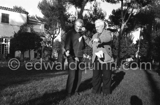 Alexander Calder and art dealer Aimé Maeght, with a Calder mobile. Saint-Paul-de-Vence 1961. - Photo by Edward Quinn