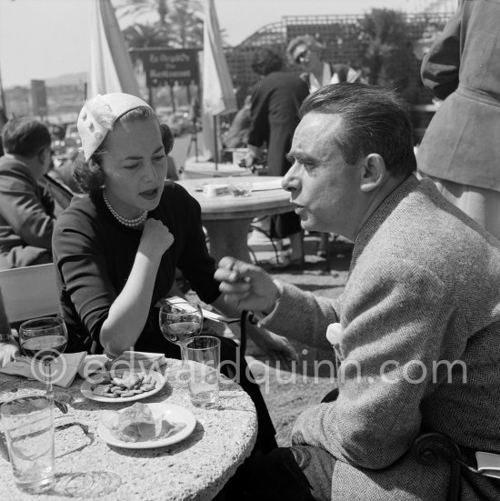 Olivia de Havilland and Henri-Georges Clouzot. Cannes Film Festival 1953. - Photo by Edward Quinn