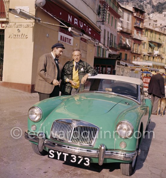 Jean Cocteau and a neighbour with his (?) MG A. Villefranche-sur-Mer 1956. - Photo by Edward Quinn