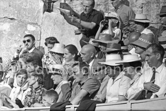 Jean Cocteau, Francine Weisweiller and her daughter Carole, Yul Brynner and his wife Doris behind them, at a bullfight. Arles 1960. - Photo by Edward Quinn