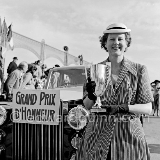 Concours d’Elégance Automobile. European cars above 9 h.p. N° 77 Rolls-Royce Silver Wraith, #WHD82, Limousine by James Young of Mrs. N. Cook won the Aga Khan Cup. Mrs. Cook and Mrs. Osborne also won "Grand Prix d\'honneur for élégance". Cannes 1951. (Detailed info on this car by expert Klaus-Josef Rossfeldt see About/Additional Infos) - Photo by Edward Quinn