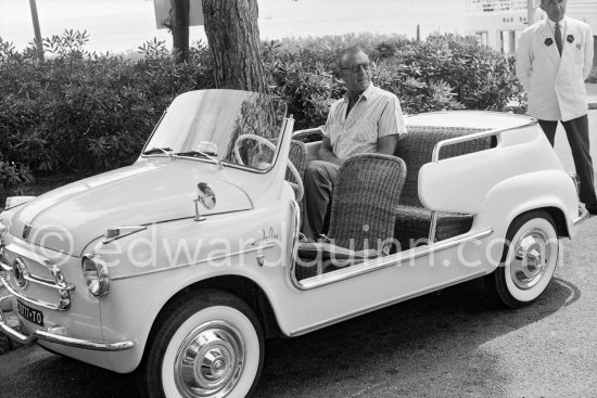 Gary Cooper\'s long legs fit well into the beach buggy of English millionaire James Hanson. Eden Roc, Cap d’Antibes 1959. Car: 1959 Fiat 600 Jolly. - Photo by Edward Quinn