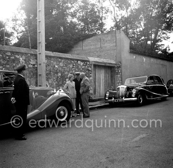 Sir Bernard Docker (Daimler car boss) and Lady Norah. Monaco 1954. Car: Daimler of Sir Bernard Docker (Daimler car boss) and Lady Norah. Built by Hooper & Co. as a Sedanca de ville, exhibited by the coachbuilders at the London Earls Court Motor Show in 1950 - Photo by Edward Quinn