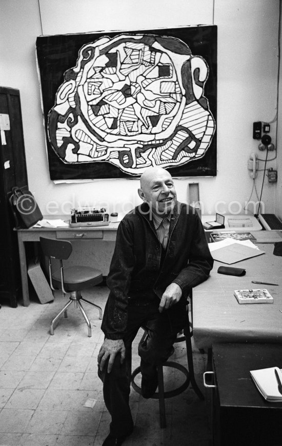 Jean Dubuffet with his painting "Pendule IV (Flamboiement de l\'heure)" at his studio in Vence 1966. - Photo by Edward Quinn