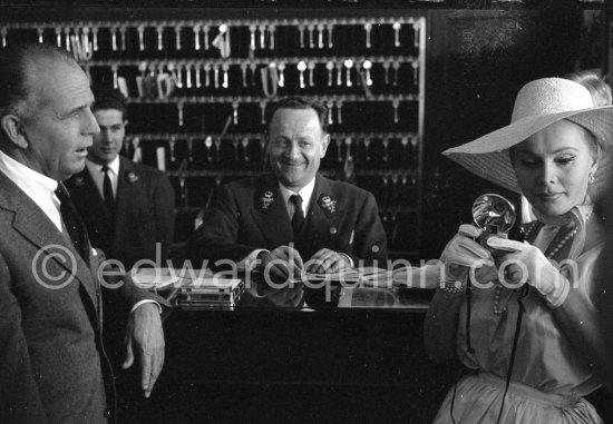 Zsa Zsa Gabor with a Kodak Starflash, her current boyfriend, millionaire Hal Hayes on the left. Cannes 1959. - Photo by Edward Quinn