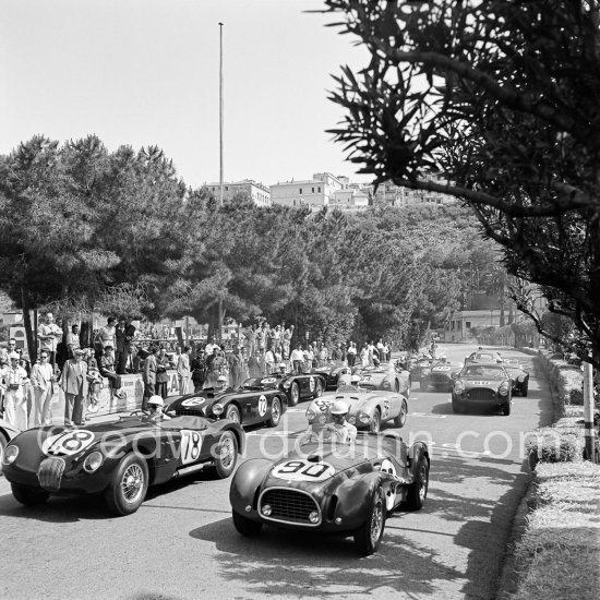 Stirling Moss, (78) Jaguar C-Type; Luigi Stagnoli, (90) Ferrari 225S; Robert Manzon, (56) Simca Gordini T15S; Reg Parnell, (72) Aston Martin DB3; "Pagnibon", (60) Ferrari 225S; Lance Macklin, (76) Aston Martin DB3; Louis Rosier, (64) Talbot-Lago T26GS; Vittorio Marzotto, (94) Ferrari 225S; Eugenio Castellotti, (92) Ferrari 225 S; Peter Collins, (74) Aston Martin DB3; Anthony Hume, (84) Allard J2. Monaco Grand Prix 1952, transformed into a race for sports cars. This was a two day event, the Sunday for the up to 2 litres (Prix de Monte Carlo), the Monday for the bigger engines, (Monaco Grand Prix). - Photo by Edward Quinn