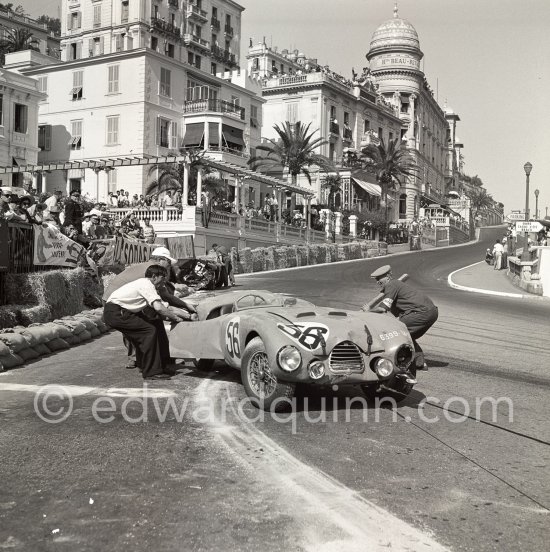 The accident at Sainte-Dévote: Robert Manzon, (56) Simca Gordini I5S. The Aston engine of Parnell blows up in the Ste-Devote and aligns his car against the straw bales, Stagnoli brakes too hard and does a double spin. Moss, Jaguar C-Type XKC 003 and Manzon find an obstructed road, spin and end up against the poor Aston, then Hume spins and reverses into the pile. Fortunately nobody gets hurt. Moss restarted after the accident, but got a black flag for receiving outside help. Monaco Grand Prix 1952, transformed into a race for sports cars. This was a two day event, the Sunday for the up to 2 litres (Prix de Monte Carlo), the Monday for the bigger engines, (Monaco Grand Prix). - Photo by Edward Quinn