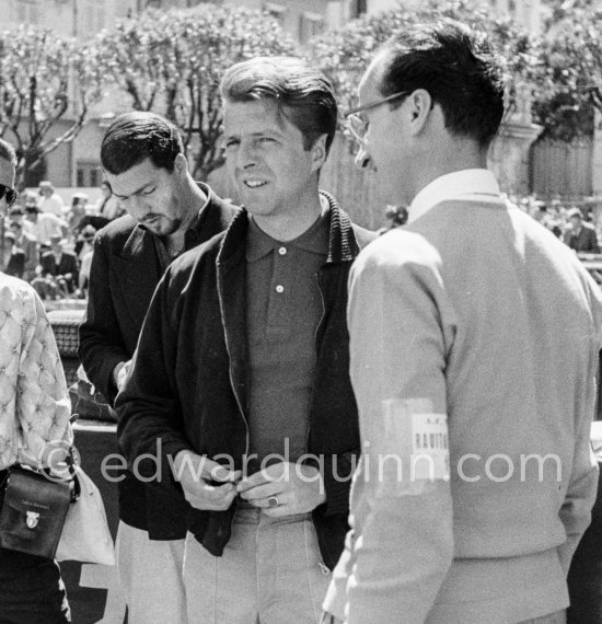 Wolfgang Graf Berghe von Trips with Ferrari racing manager Romolo Tavoni,  in the background Joakim Bonnier. Monaco Grand Prix 1958. - Photo by Edward Quinn