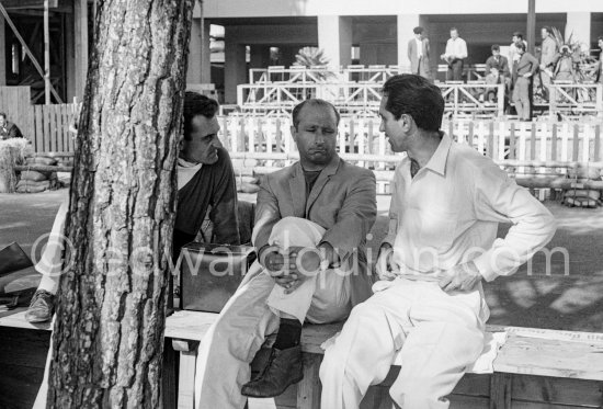 Juan Manuel Fangio, Harry Schell (left), Carlos Menditeguy. Monaco Grand Prix 1957. - Photo by Edward Quinn