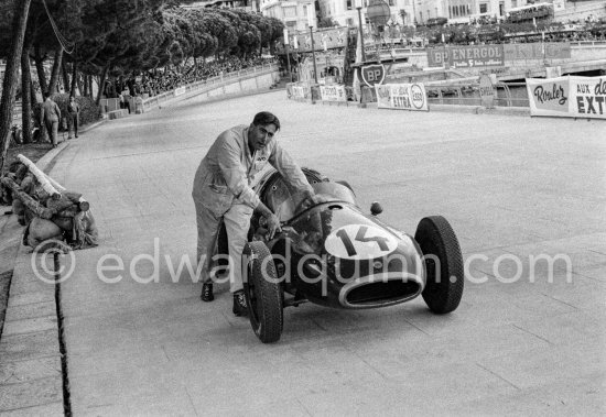 The slowest time, approximately ten minutes, was recorded by Brabham, who pushed his (14) Cooper T43 from the tunnel all the way to the finishing line with a faulty fuel pump. This gallant effort was sufficient for him to claim sixth place as a down payment on a great future. Monaco Grand Prix 1957. - Photo by Edward Quinn