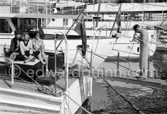 Stirling Moss, his wife Katie (left) and friends on the yacht The Shrimp. Monaco harbor 1959. - Photo by Edward Quinn