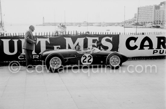 Innes Ireland pushes his N° 22 Lotus 18 uphill and right around the twisting Monaco circuit so that he can finish the race. His effort was repaid when he got 9th place and one point for the world championship. Monaco Grand Prix 1960. - Photo by Edward Quinn