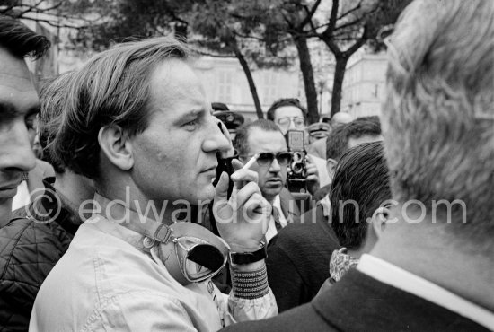 Driver briefing by Louis Chiron. Innes Ireland. Monaco Grand Prix 1962. - Photo by Edward Quinn