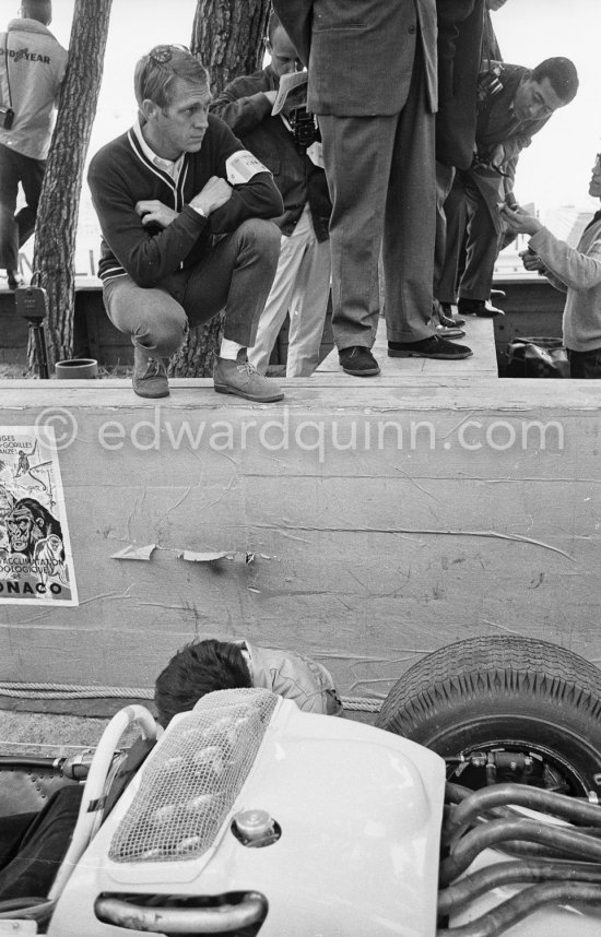 Steve McQueen at the Monaco Grand Prix 1965. In the foreground Honda RA 272 of Richie Ginther being prepared for the race. Monaco Grand Prix 1965. - Photo by Edward Quinn