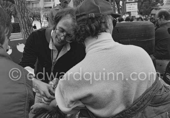 Before one of the trial runs, Niki Lauda\'s doctor gave him an injection and made a blood test. Laude rarely smiles, but submitted to this good humouredly. Monaco Grand Prix 1978. - Photo by Edward Quinn