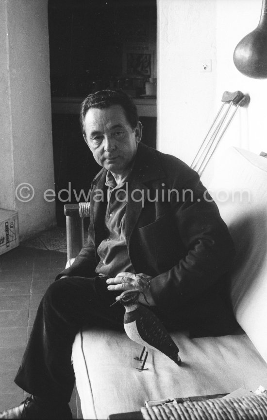 Hans Hartung with a small bird sculpture. At his house in Saint-Paul-de-Vence 1961. - Photo by Edward Quinn