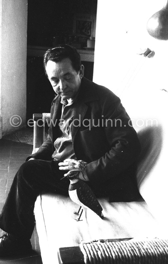 Hans Hartung with a small bird sculpture. At his house in Saint-Paul-de-Vence 1961 - Photo by Edward Quinn