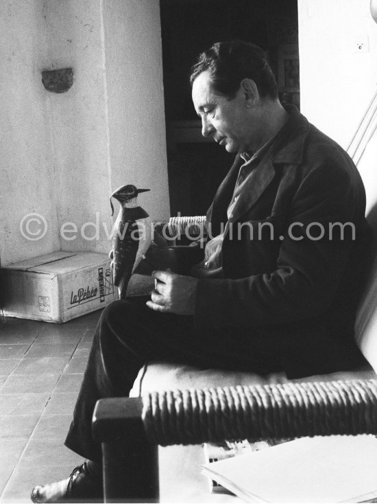 Hans Hartung with a small bird sculpture. At his house in Saint-Paul-de-Vence 1961. - Photo by Edward Quinn