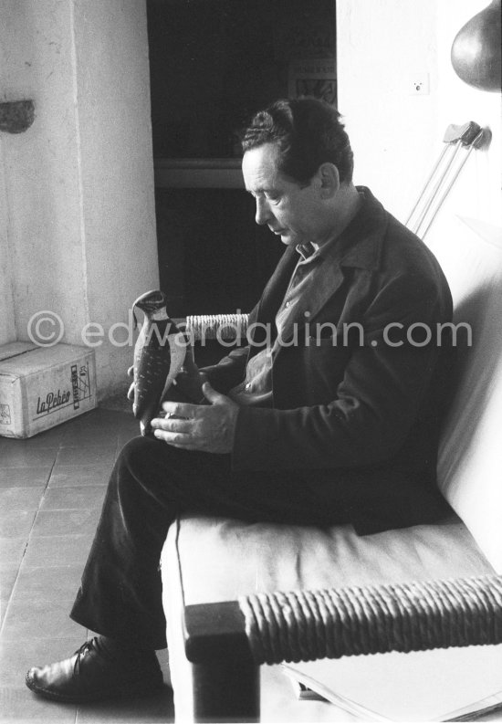 Hans Hartung with a small bird sculpture. At his home in Saint-Paul-de-Vence 1961. - Photo by Edward Quinn