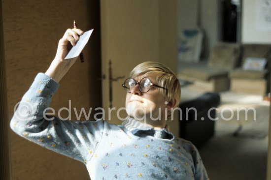 David Hockney working on the set design for "The Rake\'s Progress" at England’s Glyndebourne Opera Festival Paris 1975. 1975. - Photo by Edward Quinn