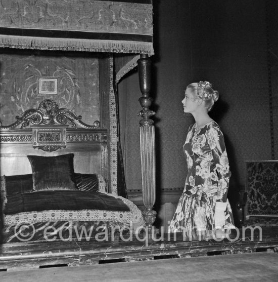 Grace Kelly (later to become Princess Grace) at the Royal Palace just before she met Prince Rainier for the first time. One of Prince Rainier’s personal servants, Michel Demorizi, guided her around some of the great number of rooms of the Royal Palace. Monaco 1955. - Photo by Edward Quinn