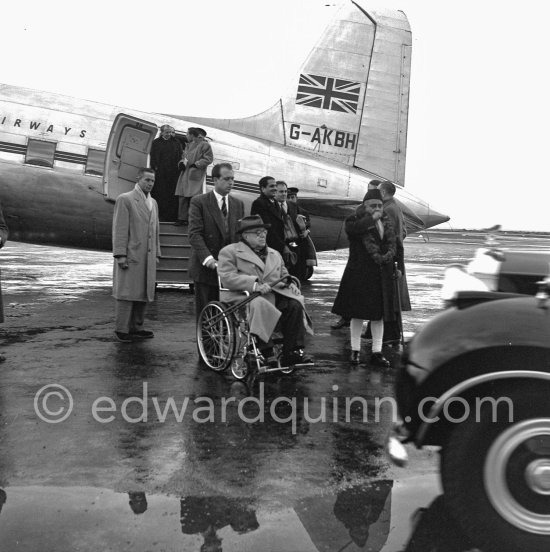 Prince Aga Khan at Nice Airport to welcome a guest. With him are his sons Prince Aly Khan and Prince Sadruddin Khan. Nice Airport 1953. Car: 1952 Rolls-Royce Phantom IV, #4AF20, Sedanca de Ville by Hooper. Detailed info on this car by expert Klaus-Josef Rossfeldt see About/Additional Infos. - Photo by Edward Quinn