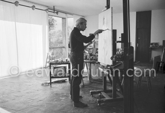 Louis le Brocquy at his studio with painting "Laussel Venus". Carros 1964. - Photo by Edward Quinn