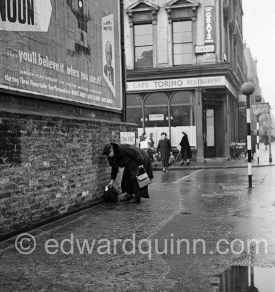 Dean Street (just south of Compton Street, London, 1950. Poster for the movie ’Seven Days to Moon’ (1950) - Photo by Edward Quinn