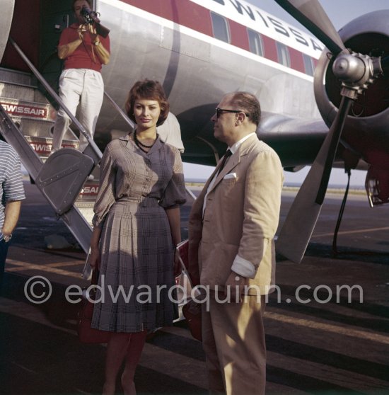 Sophia Loren and her husband Carlo Ponti arriving at Nice Airport for Cannes Film Festival 1958. - Photo by Edward Quinn