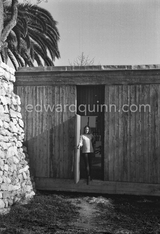 Anne Madden at the entrance to the studio, which she shared with her husband Louis le Brocquy. Carros 1964. - Photo by Edward Quinn