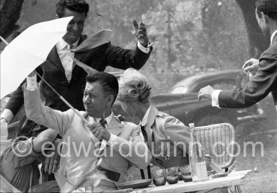 Paul Meurisse (white suit) during filming of “Le Déjeuner sur l\'herbe” at the Auguste Renoir house "Les Collettes". Cagnes-sur-Mer 1959. - Photo by Edward Quinn