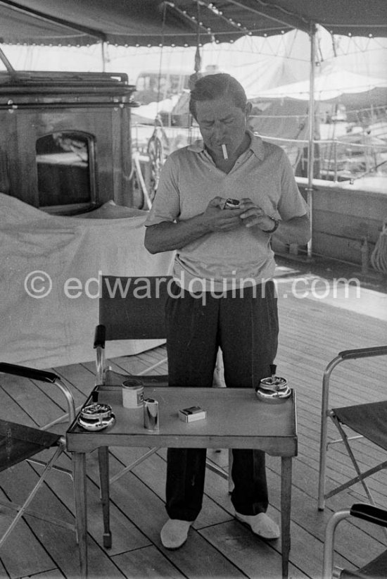 Stavros Niarchos on board his schooner Le Créole. Villefranche 1955. - Photo by Edward Quinn