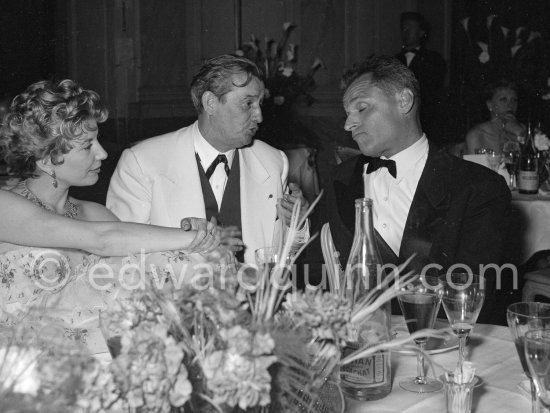 Marcel Pagnol, Jury President of the Cannes Film Festival and not yet identified persons. At a party given by Sir Alexander Korda at Les Ambasadeurs. Cannes 1955. - Photo by Edward Quinn