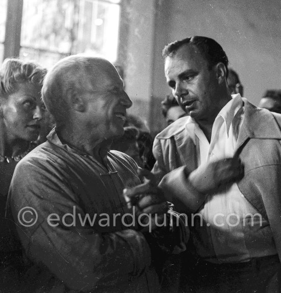 Pablo Picasso and Aly Khan at the summer ceramic exhibition "Japon. Céramique contemporaine" at the Nérolium. Vallauris 21.7.1951. - Photo by Edward Quinn