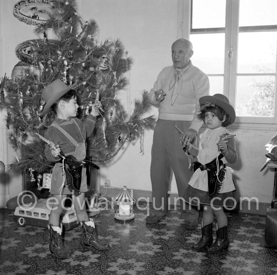 Pablo Picasso with Paloma Picasso and Claude Picasso. Christmas at La Galloise, Vallauris 1953. - Photo by Edward Quinn