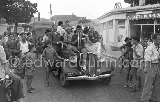 Parade which proceeded the bullfight staged by Pablo Picasso at Vallauris 1954. Car: Mathis EMY 4-S 1934 Saint Moritz - Photo by Edward Quinn