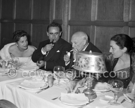 Pablo Picasso, Jacqueline, Henri-Georges Clouzot and Vera Clouzot attending the showing of "Le mystère Picasso". Cannes Film Festival 1956. - Photo by Edward Quinn